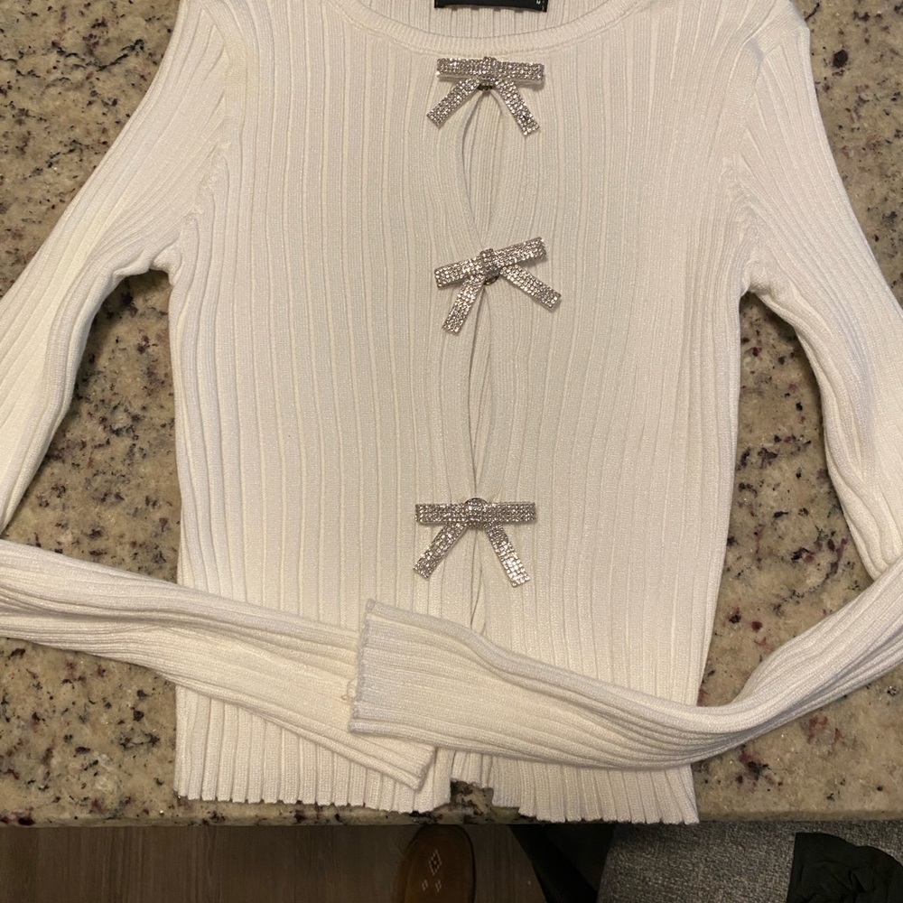 Elegant White Sweater with Bow Accents